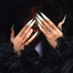 Illustration for article titled Cardi Bs Coat of Many Feathers Is the Only Acceptable Outfit for Court
